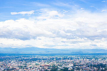 Aerial view City  from the viewpoint on top of the mountain with blue sky and cloud , Chiang Mai , Thailand