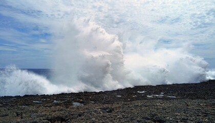 Fototapeta na wymiar huge waves burst into the sky with gunfire like explosions