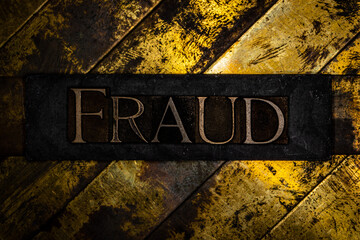 Fraud text on vintage textured grunge copper and gold background