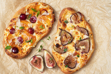 Sweet pie pizza or fruit focaccia with figs, cherry , apricot ,cream cheese, and mint