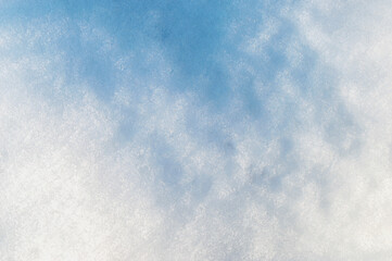 Winter snow. Snow texture Top view of the snow. Texture for design. Snowy white texture. Snowflakes. Frosty winter day.