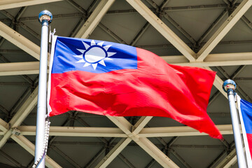 Taiwan flag in flagpole with the building background