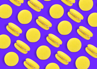 Delicious macarons on blue background, flat lay