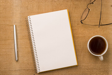 Empty notebook ready for mockup on wooden table, top view, flatlay.