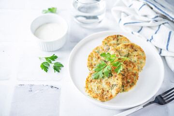 Zucchini dill parsley fritters with Greek Yogurt Sauce