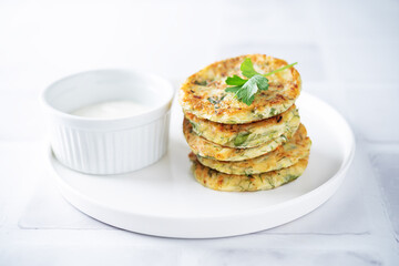 Zucchini dill parsley fritters with Greek Yogurt Sauce