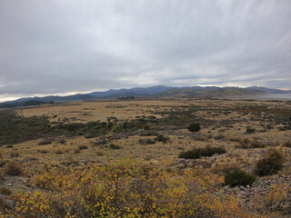 Rural landscape. The golden valley and yellow grassland in autumn, very early in the morning.	