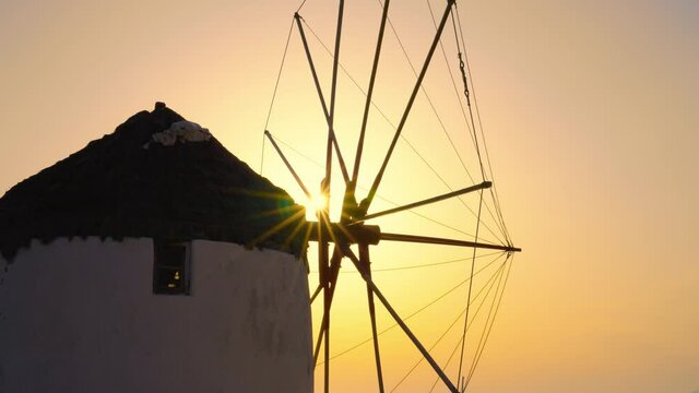 Sunset golden hour of an old windmill on Mykonos Island, Greece