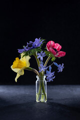 
bouquet of anemone narcissus and hyacinths