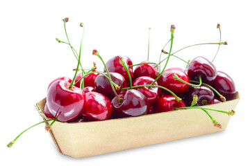 A handful of sweet cherries in a cardboard box on a white background, sweet cherry isolate on a white background