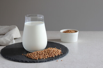 Vegan milk from buckwheat on the table. Vegan or vegetarian milk. Vegetables milk.