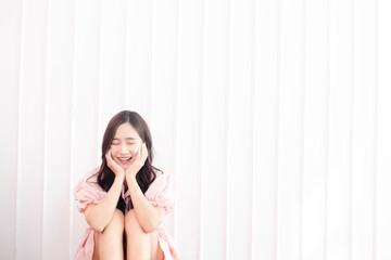 Happy woman smile on white wall background