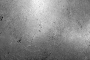 Stainless steel with scratches background texture.