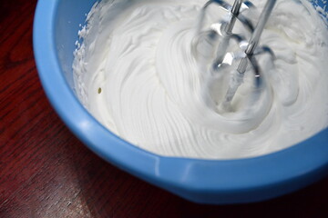 white whipped texture. latte foam, whipping cream, frothy egg white. whipped cream background.