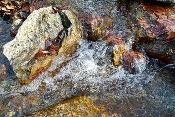 Beautiful water texture. River in motion. Water natural background.