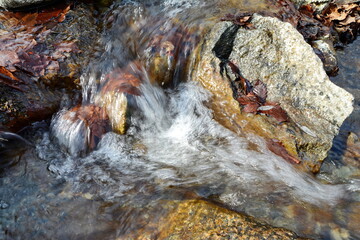 Beautiful water texture. River in motion. Water natural background.