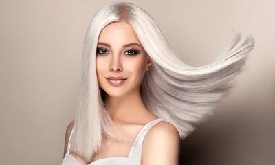 Zelfklevend Fotobehang Beautiful girl with hair coloring in ultra blond. Stylish hairstyle done in a beauty salon. Fashion, cosmetics and makeup © Sofia Zhuravetc