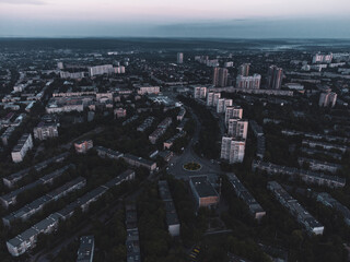 Naklejka na ściany i meble Aerial morning view Kharkiv city Pavlove Pole district near 23 Serpnia. Multistory buildings, city streets in summer dawn light