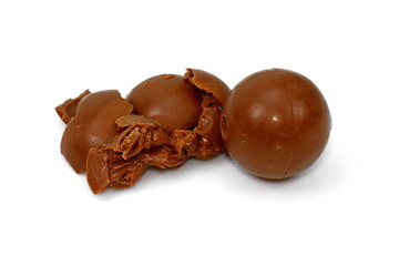 Chocolate ball isolated on a white background. Sweet chocolate candy 