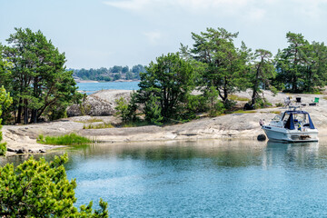 A boat has moored at a very nice island in the St. Anna archipelago in the Baltic Sea, Sweden