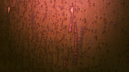 Steel plate covered with old deep red rust.