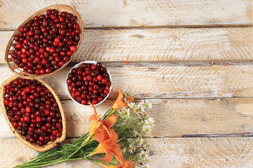 Harvesting in august, cherries on wooden background, rustic style, healthy natural food concept, store advertisement, business card for cafe, invitation with place for text,