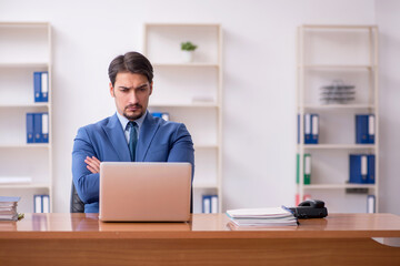 Young businessman employee working in the office