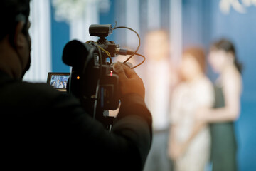 videographer, man working with camera