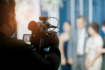 videographer, man working with camera