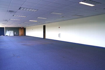 empty office building interior with furniture removed before renovation