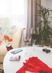 Bedroom mess with lingerie and shoes, quick sex concept
