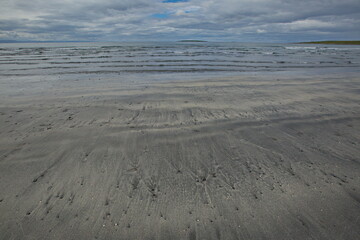 Sandy beach of the Barents Sea