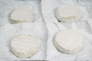 The process of making and packaging camembert cheese.