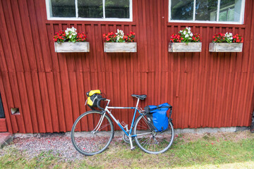 Fototapeta na wymiar Haverud, Sweden A bicycle parked along the Dalsland Canal in western central Sweden.