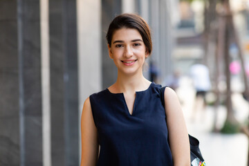 Fototapeta premium Portrait Business Women Style. Young female in the city.