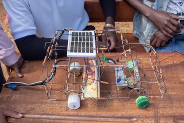 Fotobehang Solar powered electric car miniature using recycled material © ivanbruno