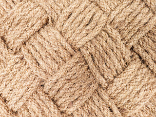 Natural doormat That weave back and forth in a mesh pattern