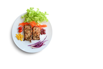 Pork steak ,salad in plate isolated on white background and copy space.