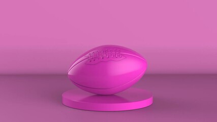 pink rugby ball on pink background