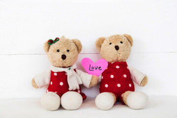 love message card handwriting with teddy bear arrangement flat lay postcard style on background white