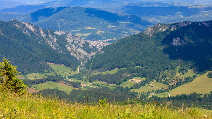 View of a rocky mountain pass from a mountain meadow. Vratna dolina, Tiesnavy, Mala Fatra © Radek Vicar