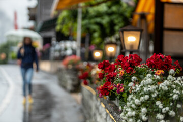 People walking with umbrella in rainy day