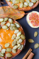 Pumpkin pies on a black plate