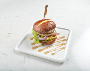 vegetarian quorn burger with tofu bean curd, mushroom and vegetables in chef special sauce charcoal...