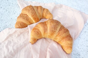 French Croissants on Pale Pink Background