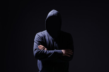 Silhouette of anonymous man on black background