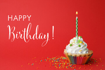 Happy Birthday! Delicious cupcake with candle on red background