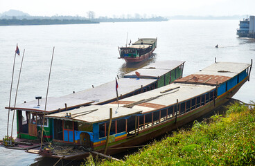 Boats on the Mekong River near Chiang Saen city. Border of Thailand and Laos. Area of the Golden Triangle. Chiang Saen, Chiang Rai Province, Thailand 