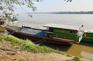 Boats on the Mekong River near Chiang Saen city. Border of Thailand and Laos. Area of the Golden Triangle. Chiang Saen, Chiang Rai Province, Thailand 
