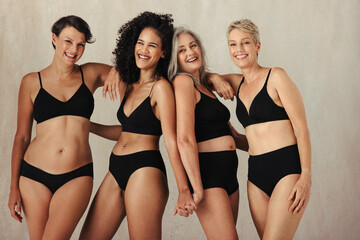 Different women of all ages celebrating their natural bodies